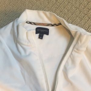 Burberry golf shirt. New without tags